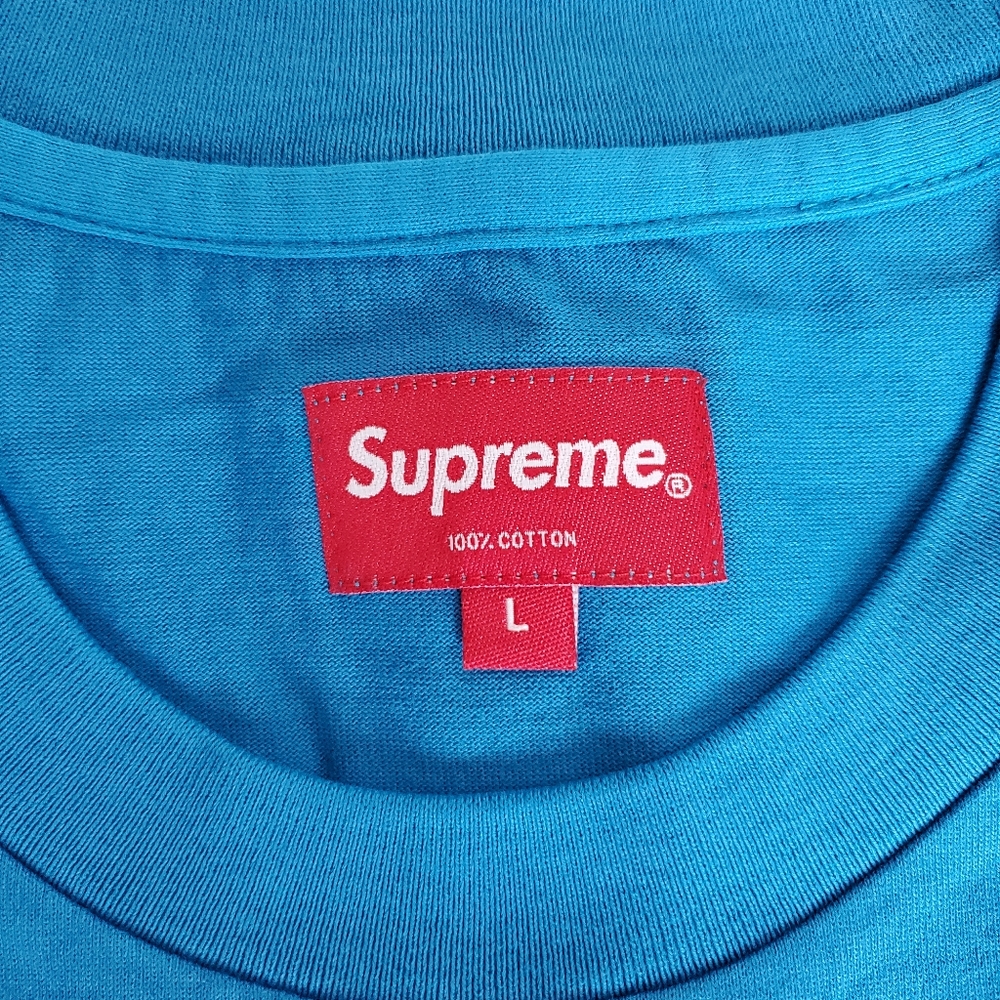 Supreme shirt and stickers
